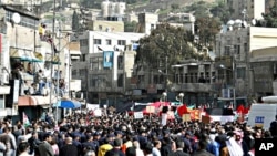 Under heavy security, thousands protested in Amman, Jordan last week. Analysts say if activist's demands are not met, what are now peaceful well-organized demonstrations are likely to turn more urgent, and more radical.