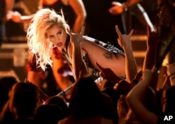 Lady Gaga performs "Moth Into Flame" at the 59th annual Grammy Awards in Los Angeles, Feb. 12, 2017.
