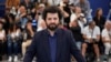 Sutradara Saeed Roustayi saat menghadiri Festival Film Cannes ke-75 di selatan Prancis, 26 Mei 2022. (Foto: Daniel Cole/AP)