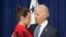 FILE - Vice President Joe Biden consoles Madeleine Smith after she recounted her story of being a rape victim while a student at Harvard University.