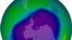 FILE - The ozone hole is shown in September 2006, with the blue and green areas signifying the least ozone.