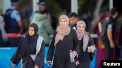 Worshippers from the Al Noor mosque and the Linwood Islamic Centre arrive for Friday prayers in advance of the anniversary of the mosque attacks that took place the prior year in Christchurch, New Zealand, March 13, 2020.
