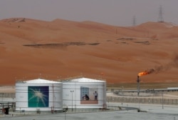 FILE - A production facility is seen at Saudi Aramco's Shaybah oilfield in the Empty Quarter, Saudi Arabia, May 22, 2018.