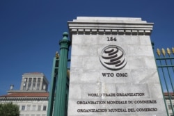 FILE - A logo is seen at the headquarters of the World Trade Organization in Geneva, Switzerland, June 2, 2020.