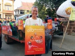 Craig Dodge, director of sales and marketing at Phare, the Cambodian Circus, at the Giant Puppet Parade, Phnom Penh, Cambodia, February 21, 2015. (Courtesy of Phare)