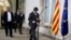 Catalonia regional President Carles Puigdemont arrives for a statement after signing the decree officially calling for the vote on a binding independence referendum, following a plenary session at the Parliament of Catalonia in Barcelona, Spain, Sept. 6, 2017.
