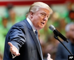 FILE - Republican presidential candidate Donald Trump speaks during a No Labels Problem Solver convention.