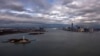 FILE - An aereal view of the Statue of Liberty, Liberty Island and Ellis Islands (L), next to New York's Lower Manhattan skyline, New York. 