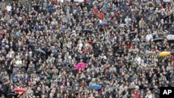 Demonstrators protest against the Scientific and Technological Research Council of Turkey [TUBITAK] over the exclusion of articles commemorating Charles Darwin's 200th birthday from a scientific journal published by TUBITAK, in Ankara, Turkey, March 2009.