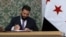 Syria's interim President Ahmad al-Sharaa signs the country's constitutional declaration, which will be enforced throughout a five-year transitional period, at the presidential palace in Damascus, March 13, 2025.