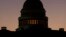 FILE - The U.S. Capitol Building Dome is seen before the sun rises in Washington, Dec. 18, 2018. 
