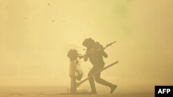 An Indian Army cadet performs drills at the Officers Training Academy in Chennai.