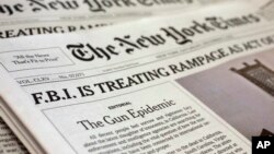 FILE - An editorial appears on the front page of the New York Times, in New York, Dec. 5, 2015. 