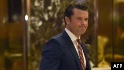 FILE - Pete Hegseth arrives at Trump Tower for a meeting with President-elect Donald Trump in New York, Nov. 29, 2016.