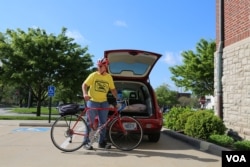Ed Chasteen bikes at least 80 kilometers (50 miles) weekly, often to meet with victims of hate crimes in need of support. (VOA/R. Taylor)