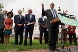 U.S. Senator Jeff Merkley (D-OR) speaks at a news conference about the Green New Deal hosted by U.S. Senator Ed Markey (D-MA) on the Northeast lawn in front of the U.S. Capitol in Washington, Sept. 17, 2019.