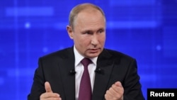 Russian President Vladimir Putin speaks during an annual nationwide televised phone-in show in Moscow, June 20, 2019.