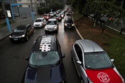 Los manifestantes el sábado 23 de enero de 2021 piden la destitución del presidente Jair Bolsora, en Sao Paulo, Brasil. [Reuters]
