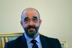 FILE - The spokesman of the Hungarian government, Zoltan Kovacs, speaks to reporters at the Hungarian Embassy in Paris, Dec.19, 2018.