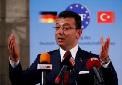 Istanbul Mayor Ekrem Imamoglu speaks after being awarded with the German-Turkish Friendship Award 'Kybele 2019' in Berlin, Nov. 8, 2019.