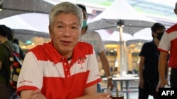 FILE - Lee Hsien Yang, the brother of Singapore's then-prime minister Lee Hsien Loong and son of the city state's founding father Lee Kuan Yew is shown during an event at the Tiong Bahru Market in Singapore on June 24, 2020