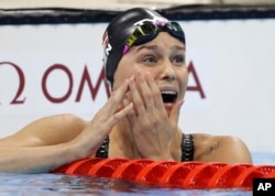 Denmark's Pernille Blume reacts after winning the women's 50-meter freestyle final during the swimming competitions at the 2016 Summer Olympics, Aug. 13, 2016, in Rio de Janeiro, Brazil.