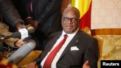FILE: Mali's President Ibrahim Boubacar Keita announced a cease-fire Friday. He's shown at a press conference Jan. 18, 2014.