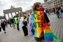 Demonstrators attend a 'This Is Solidarity' rally organized by the Unteilbar (Indivisible) movement, in Berlin, Germany, June 14, 2020.