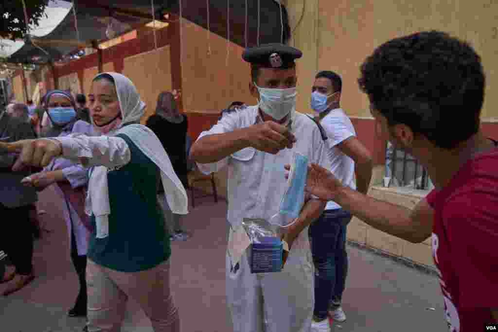 The number of COVID-19 cases is still rising in Egypt, but at a considerably slower pace than in recent weeks, in Cairo, Aug. 11, 2020. 
