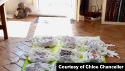 Supplies of face masks created by Chloe Chancelier's Facebook group. 