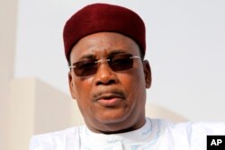 In this pictured taken July 2, 2018, Niger president Mahamadou Issoufou addresses the media as part of an African Union summit, in Nouakchott, Mauritania.