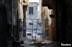 A police barrier blocks a narrow back alley of Sur, an historical district of southeastern province of Diyarbakir, Turkey, March 10, 2017.