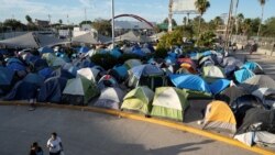 Migrants camp on the Mexican border just south of the Rio Grande, in Matamoros, Mexico, on November 1, 2019.