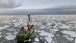 FILE - Greenpeace's Arctic Sunrise ship navigates through floating ice in the Arctic Ocean, Sept. 15, 2020.