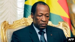 FILE - Burkina Faso President Blaise Compaore announced he was stepping down following violent protests demanding an end to his 27-year rule, Oct. 31, 2014.