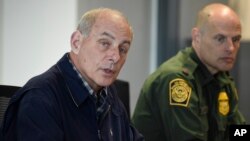 Secretary of Homeland Security John Kelly, left, speaks as Chief of U.S. Border Patrol Ronald Vitiello looks on during a meeting held at the San Ysidro Port of Entry, Feb. 10, 2017, in San Diego.