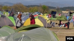 Winter rains destroyed many of refugees’ tents, with some people falling ill from the cold. Some say if the refugees are still here in the summer, the heat may be worse than the rains, in Idomeni, Greece, March 31, 2016. (H. Murdock/VOA)