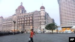 President Barack Obama shakes hands before his State of the Union address to a joint session of Congress Jan. 24, 2012, at the Capitol in Washington. (AP)