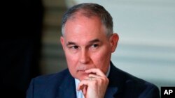 FILE - Environmental Protection Agency Administrator Scott Pruitt attends a meeting at the White House in Washington, Feb. 12, 2018. 