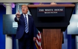 U.S. President Donald Trump discussing the drug hydroxychloroquine to treat COVID-19 during the daily press conference with the coronavirus emergency team at the White House in Washington, D.C., April 5, 2020. REUTERS/Joshua Roberts