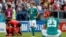 German midfielder Mesut Ozil, center, reacts after a 2-0 loss to South Korea that eliminated Germany from the World Cup, June 27, 2018, in Kazan Arena in Kazan, Russia.