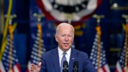 FILE - President Joe Biden delivers remarks at NJ Transit Meadowlands Maintenance Complex to promote his "Build Back Better" agenda, in Kearny, N.J., Oct. 25, 2021.
