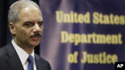 Tourists (background) take a stroll at the Tulip Garden, claimed to be Asia's largest, in Srinagar, India. The site is the largest tulip garden of Asia and is spread over an area of about 12 hectares. 