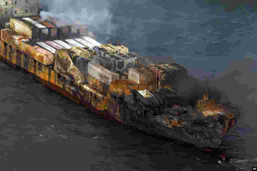 Smoke billows from the MV Solong cargo ship in the North Sea, off the Yorkshire coast in England. The cargo ship carrying a toxic chemical hit a tanker carrying jet fuel for the U.S. military off England, setting both vessels on fire and sending fuel pouring into the North Sea on March 10. One crew member is missing and presumed dead after the collision. The other 36 crew members survived.
