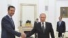 Assad Iyo Putin Oo Ku Kulmay Moscow