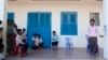 FILE - Teachers lead vision tests on students at a school in Siem Reap, Cambodia, Oct. 12, 2016, aided in part by Sightsavers International. In recognition of International Women’s Day 2025, the charity called to close the gender employment gap, particularly for the disabled.
