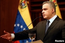 Venezuela's chief prosecutor Tarek William Saab gestures as he talks to the media during a news conference in Caracas, Venezuela, Nov. 2, 2017.