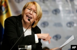 FILE - Venezuela's Chief Prosecutor Luisa Ortega gives a press conference in Caracas, Venezuela, July 4, 2017.