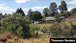 The site where a small plane carrying cocaine has crashed, after a high-speed airborne chase with authorities, in Queretaro, Mexico, Oct. 7, 2020, in this image taken from video. (Circuito Radical Queretaro/via REUTERS)