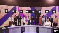 A handout photo issued by Mexico’s National Electoral Institute shows seated presidential candidates, from left, Claudia Sheinbaum, Jorge Álvarez Maynez, and Xochitl Galvez during a debate in Mexico City, on April 7, 2024. 
